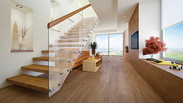 Contemporary interior with wooden stairs, a sofa, and a wide window view.