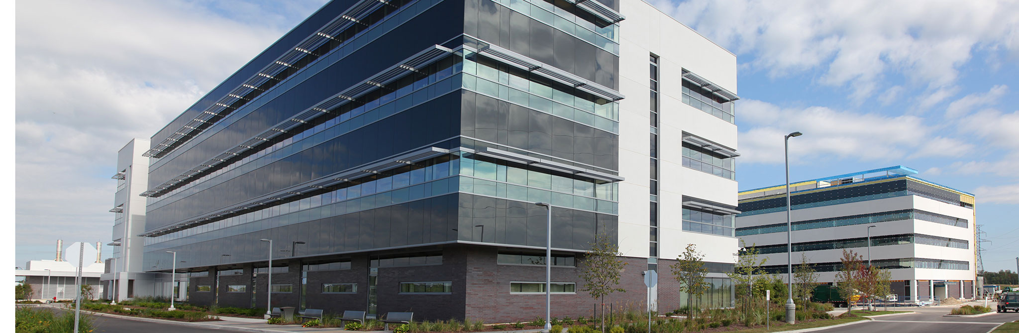 Contemporary office buildings with reflective glass facades. 